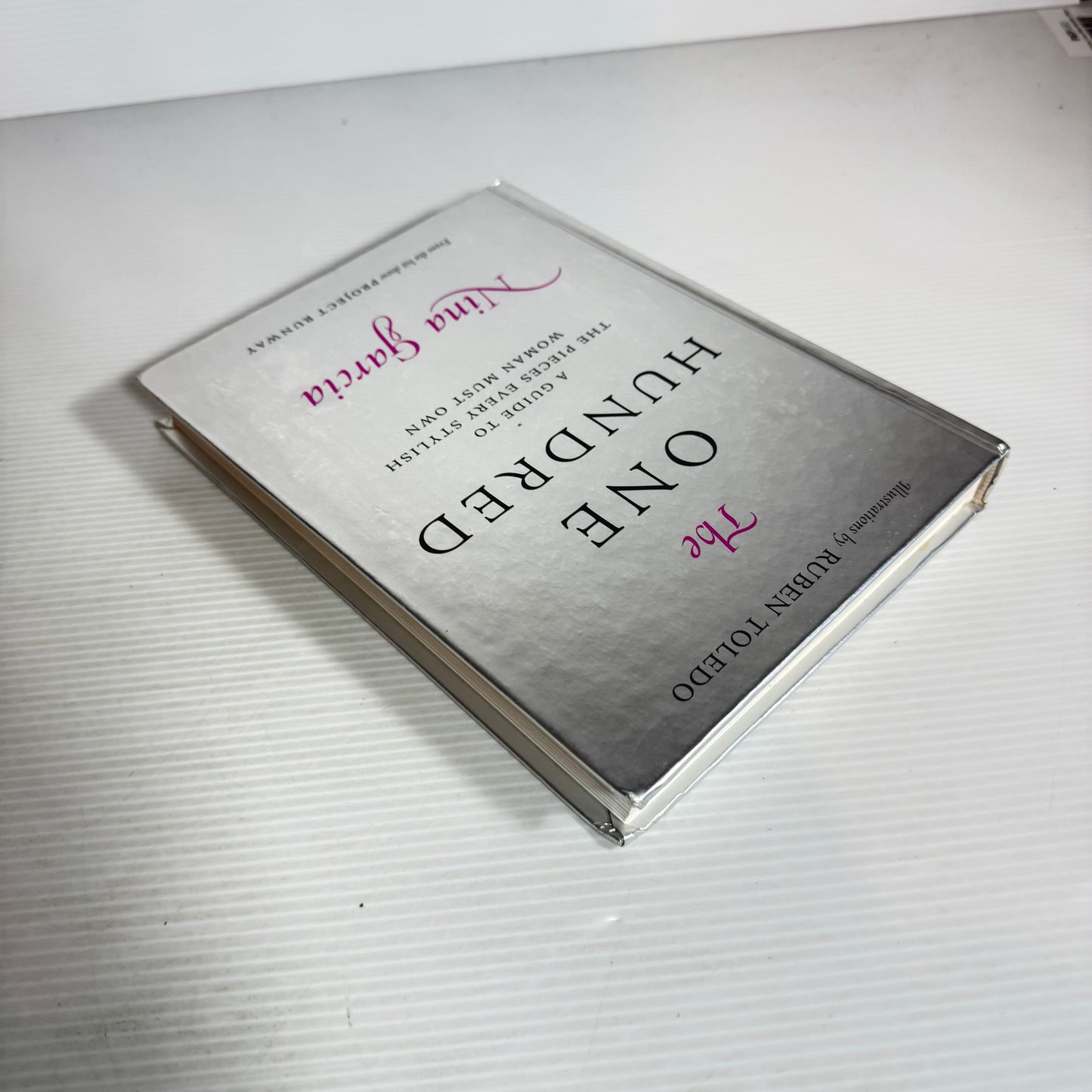 The One Hundred : A Guide to The Pieces Every Stylish Woman Must Own - Nina Garcia