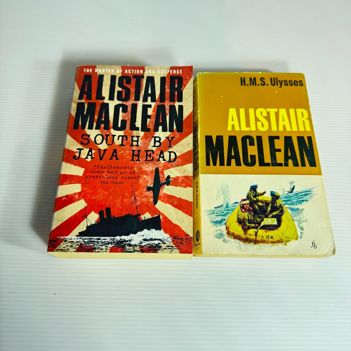 Alistair MacLean Book Bundle x 2 Books : H.M.S Ulysses (1969) & South By Java Head (2008) (2216)
