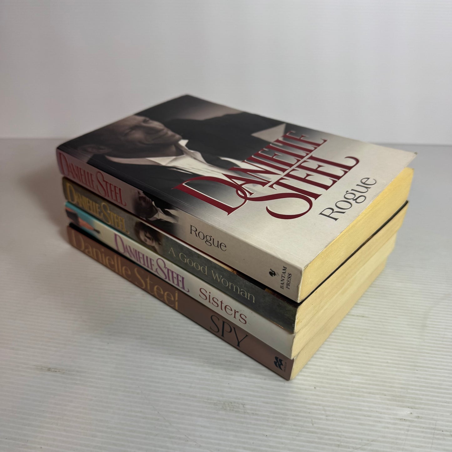 Danielle Steel Large Paperback Book Bundle x 4 : A Good Woman, Spy, Rogue, Sisters (2820)