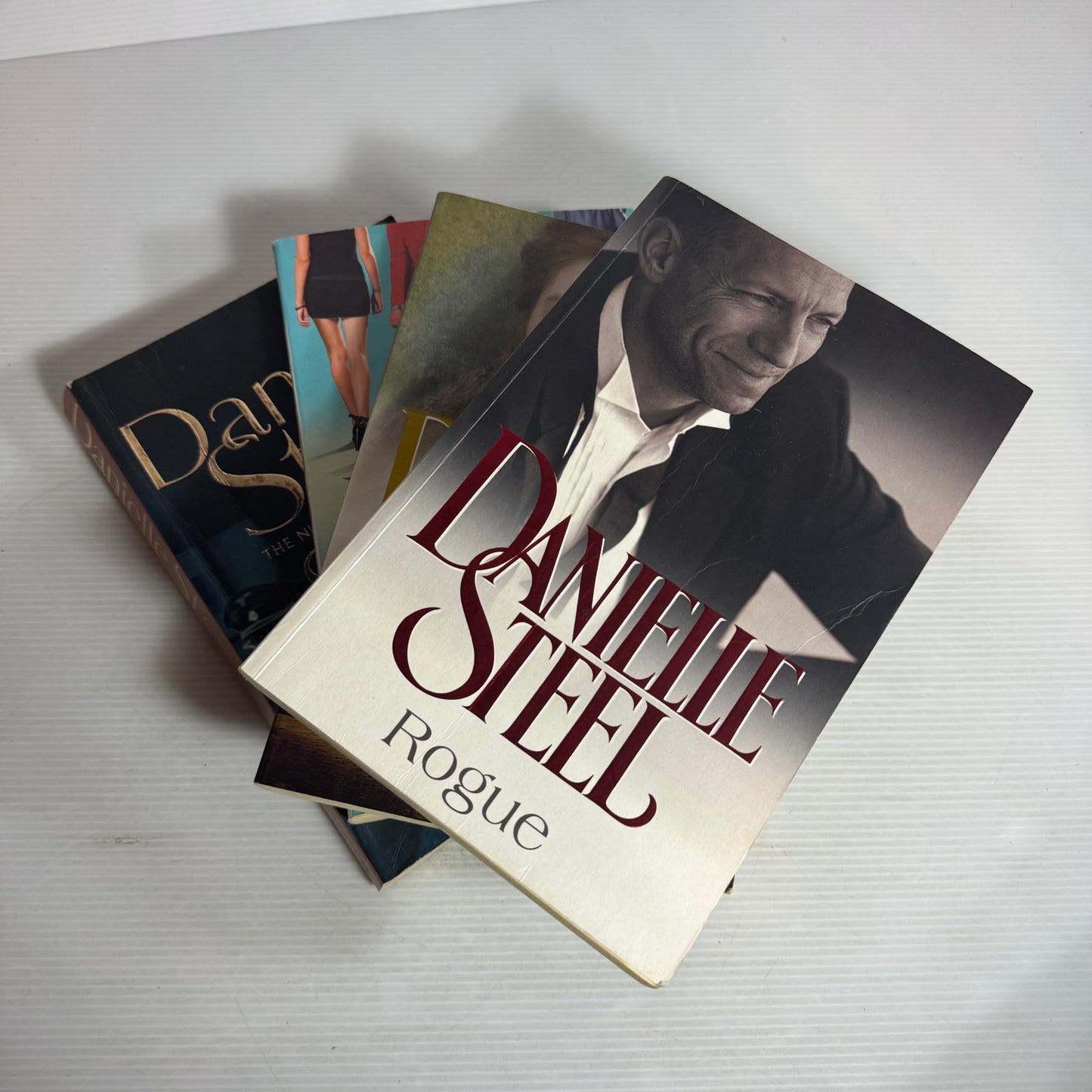 Danielle Steel Large Paperback Book Bundle x 4 : A Good Woman, Spy, Rogue, Sisters (2820)