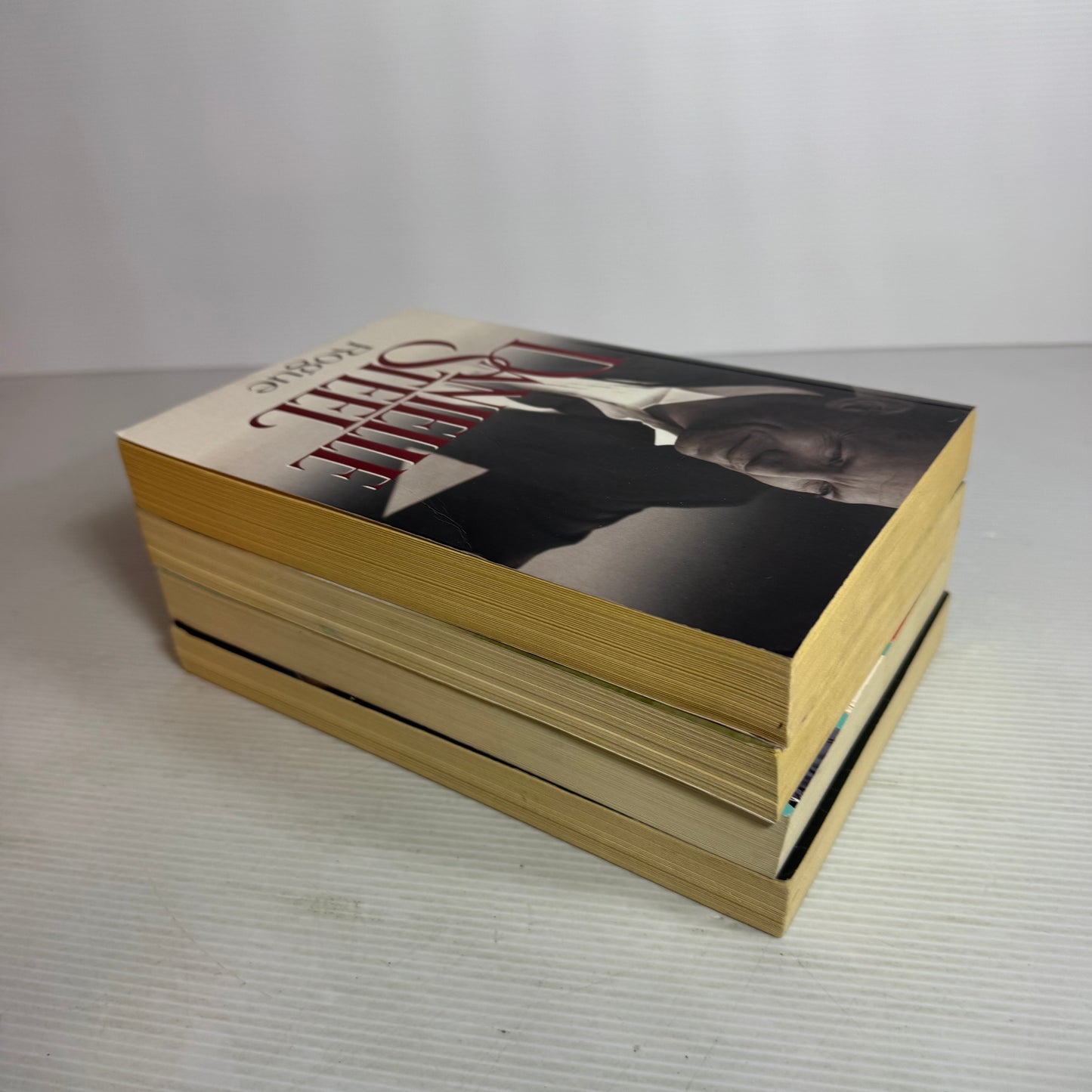 Danielle Steel Large Paperback Book Bundle x 4 : A Good Woman, Spy, Rogue, Sisters (2820)