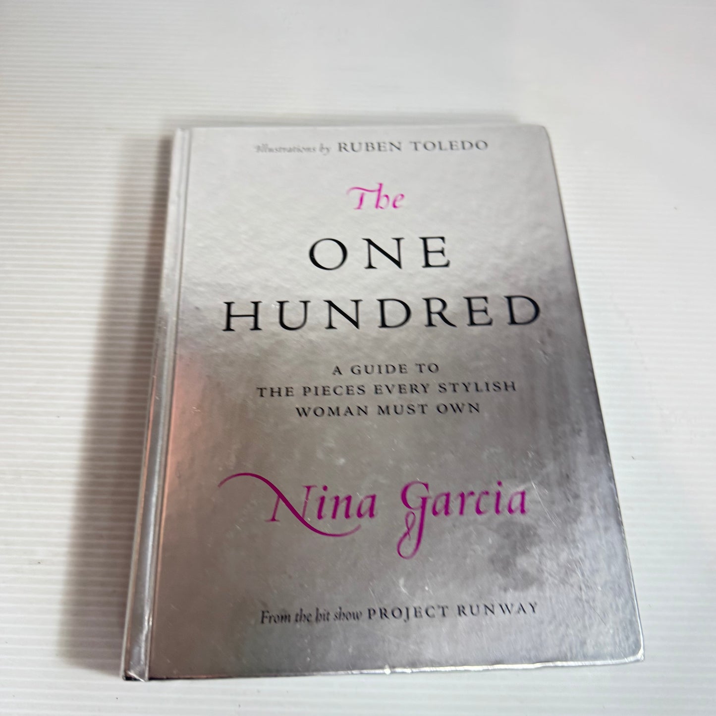The One Hundred : A Guide to The Pieces Every Stylish Woman Must Own - Nina Garcia
