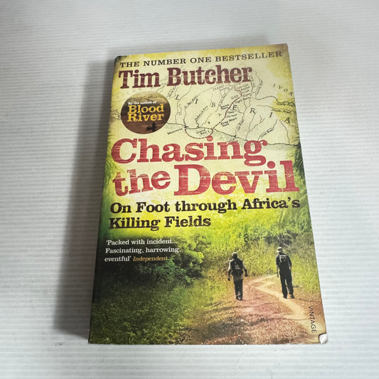 Chasing the Devil : On Foot Through Africa's Killing Fields - Tim Butcher