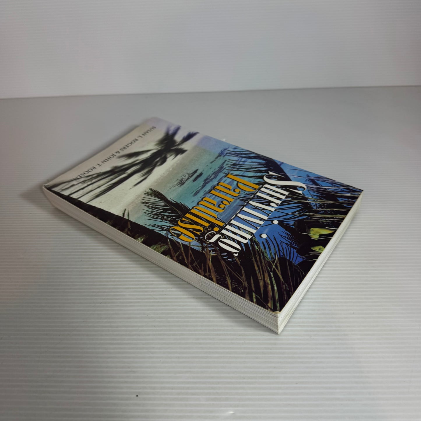 Surviving Paradise - Susan L. Rogers & John T. Roosen
