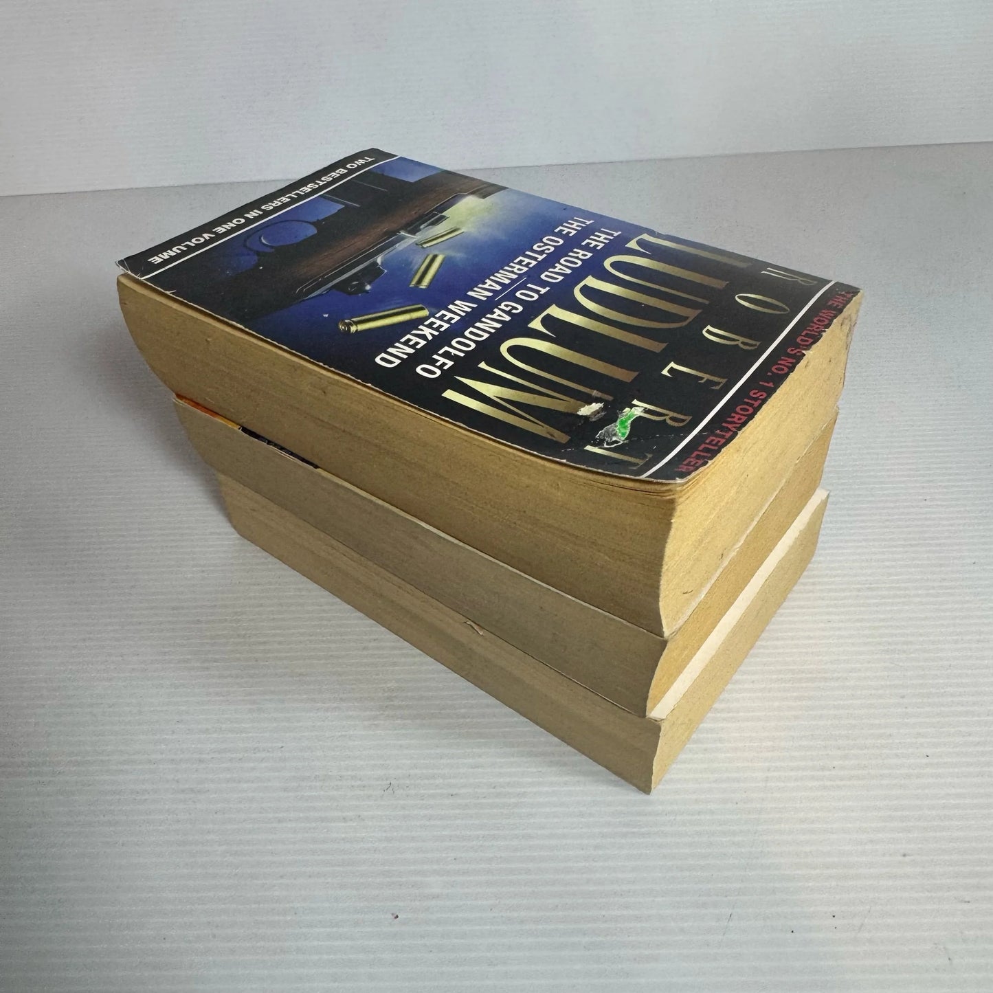 Robert Ludlum Book Bundle x 3 Books x 4 Stories : The Road to Gandolfo, The Osterman Weekend, The Apocalypse Watch, The Crey of the Halidon(2339)