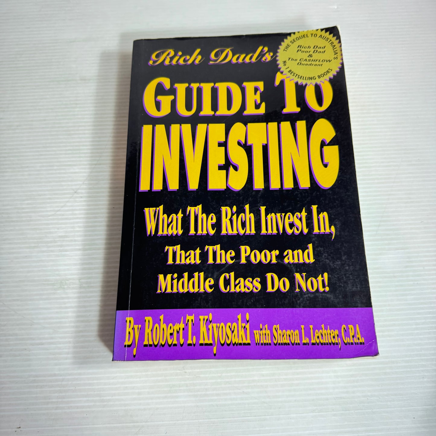 Rich Dad's Guide To Investing - Robert T. Kiyosaki with Sharon L. Lechter, C.P.A.