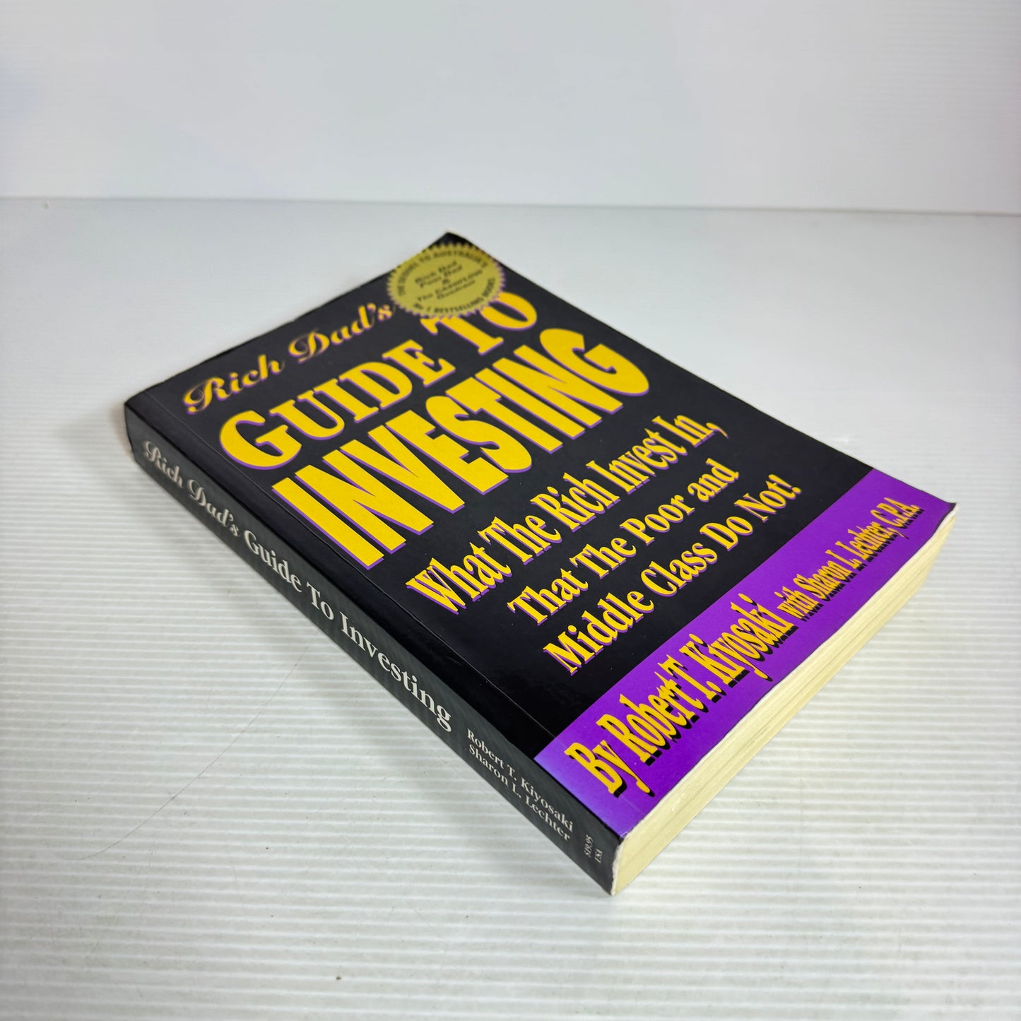 Rich Dad's Guide To Investing - Robert T. Kiyosaki with Sharon L. Lechter, C.P.A.