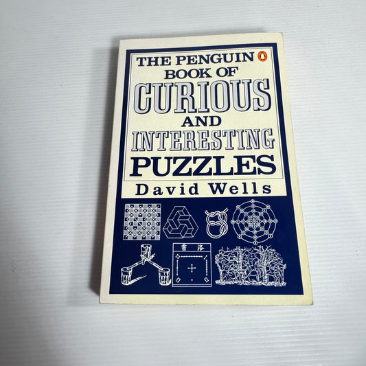 The Penguin Book of Curious and Interesting Puzzles - David Wells