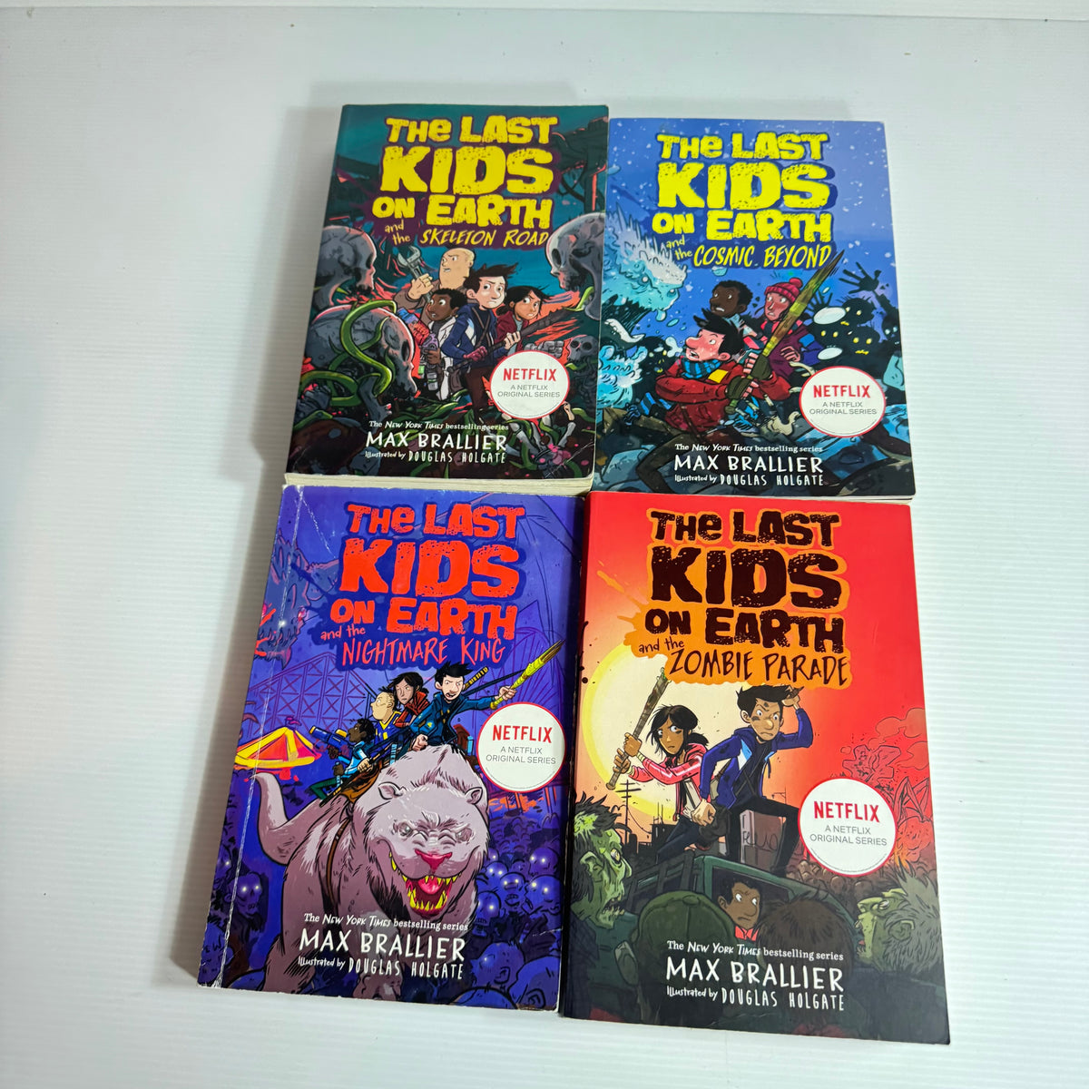 The Last Kids On Earth - Max Brallier Book Bundle x 4 Books : Skeleton Road, Cosmic Beyond, Zombie Parade, The Nightmare King(3264)