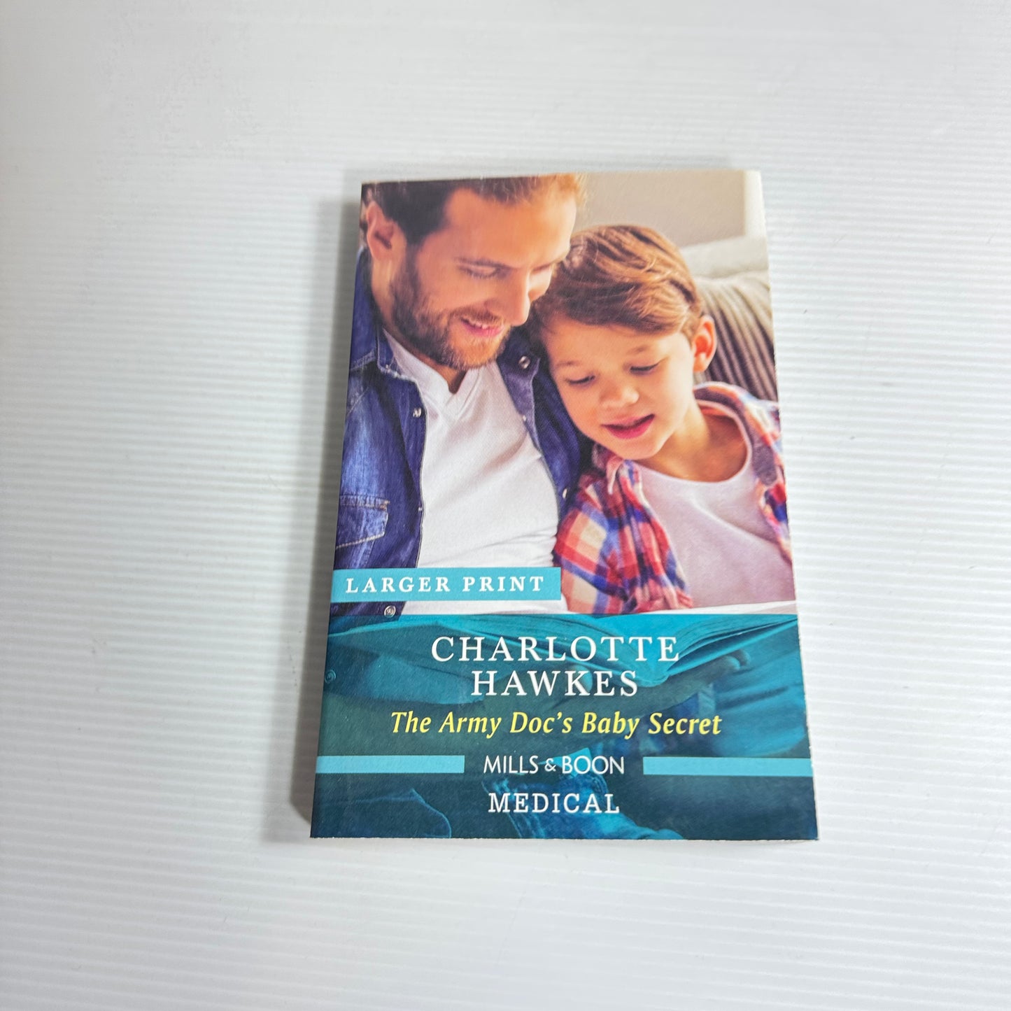 The Army Doc's Baby Secret - Charlotte Hawkes (Larger Print) Mills & Boon Medical (New)