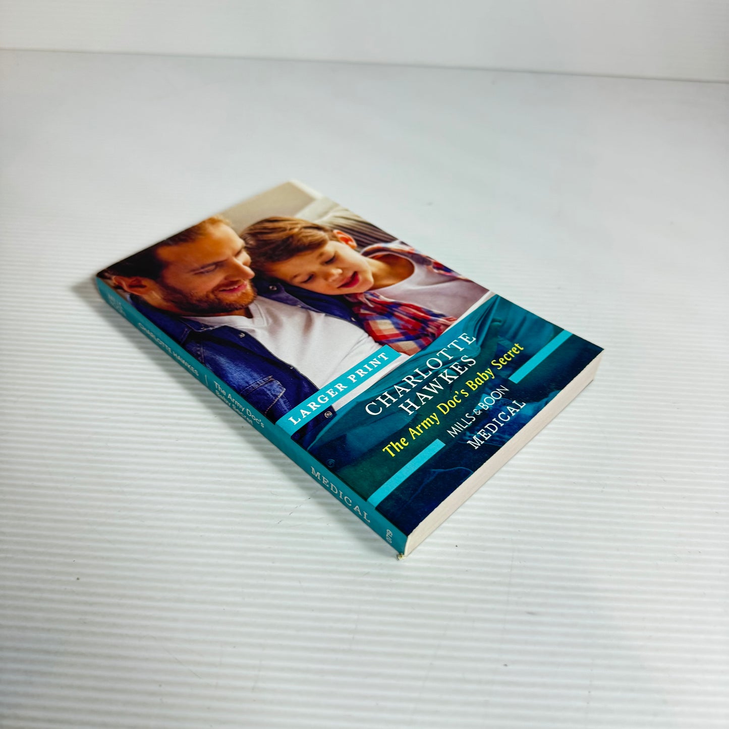 The Army Doc's Baby Secret - Charlotte Hawkes (Larger Print) Mills & Boon Medical (New)