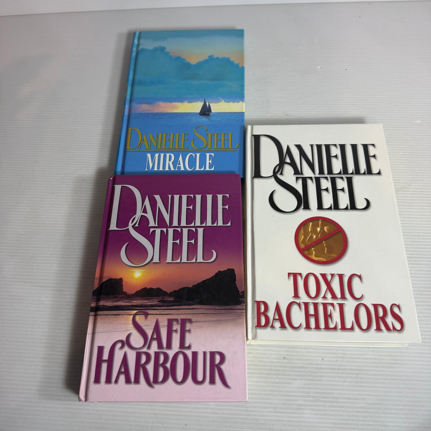 Danielle Steel Hardcover Book Bundle x 3 : Miracle, Safe Harbour, Toxic Bachelors (2823)