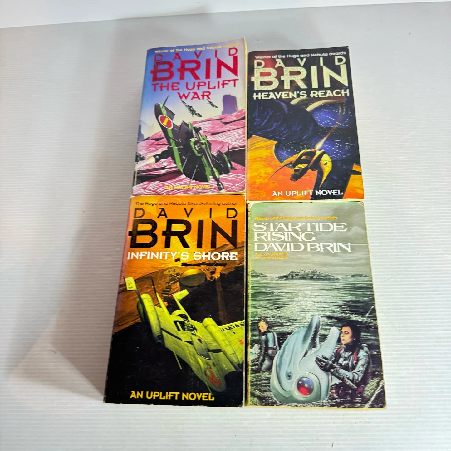 David Brin Science Fiction Book Bundle x 4 Books : The Uplift War, Heaven's Reach, Startide Rising, Infinity's Shore (2123)