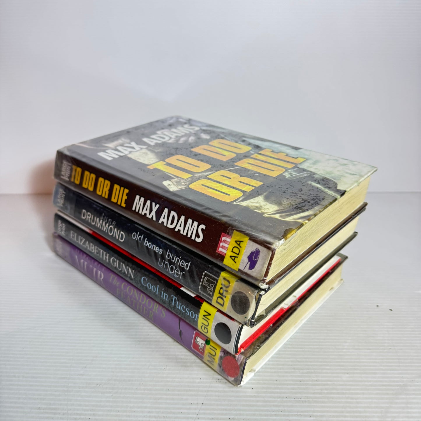 Large Print Crime Book Bundle x 4 : Old Bones Buried Under, To Do Or Die, Cool in Tucson, The Condor's Feather(2869)