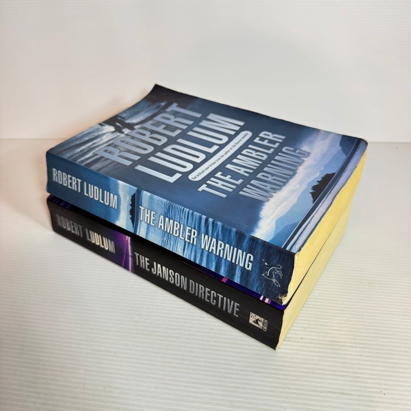 Robert Ludlum Book Bundle x 2 : The Janson Directive & The Ambler Warning (2466)