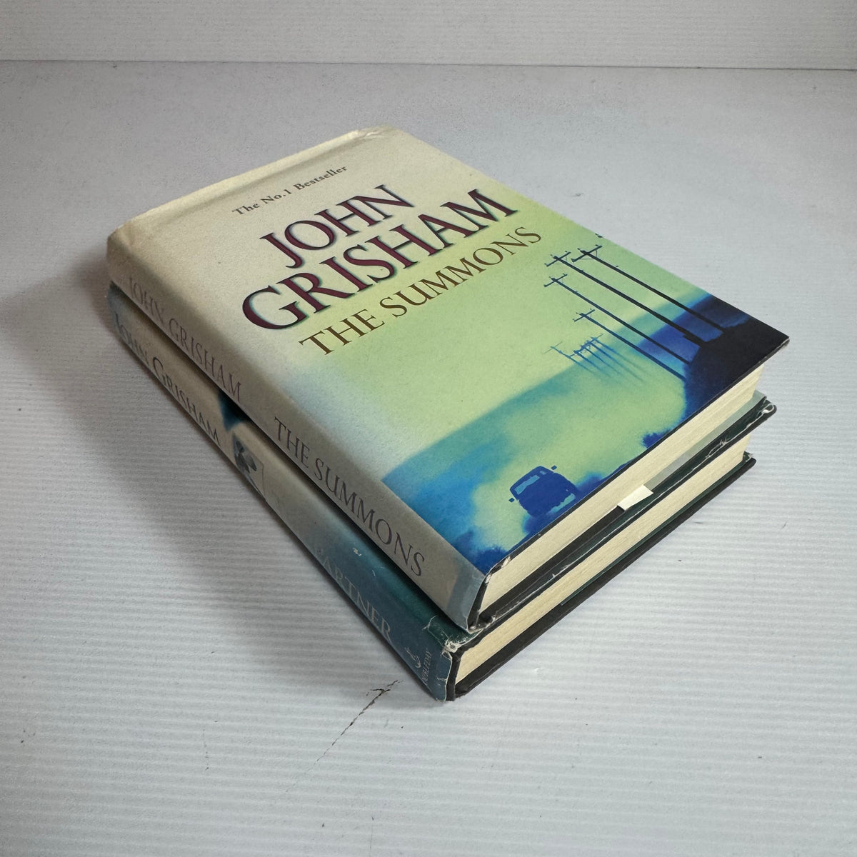 John Grisham Hardcover Book Bundle x 2 : The Summons & The Partner (3279)