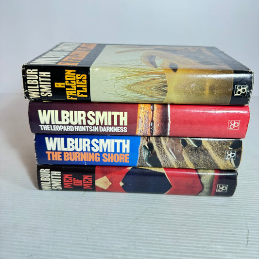Wilbur Smith Vintage Medium Hardcover x 4 : The Leopard Hunts In the Darkness, Men of Men, A Falcon Flies, The Burning Shore (Vintage 1980's)(2967)