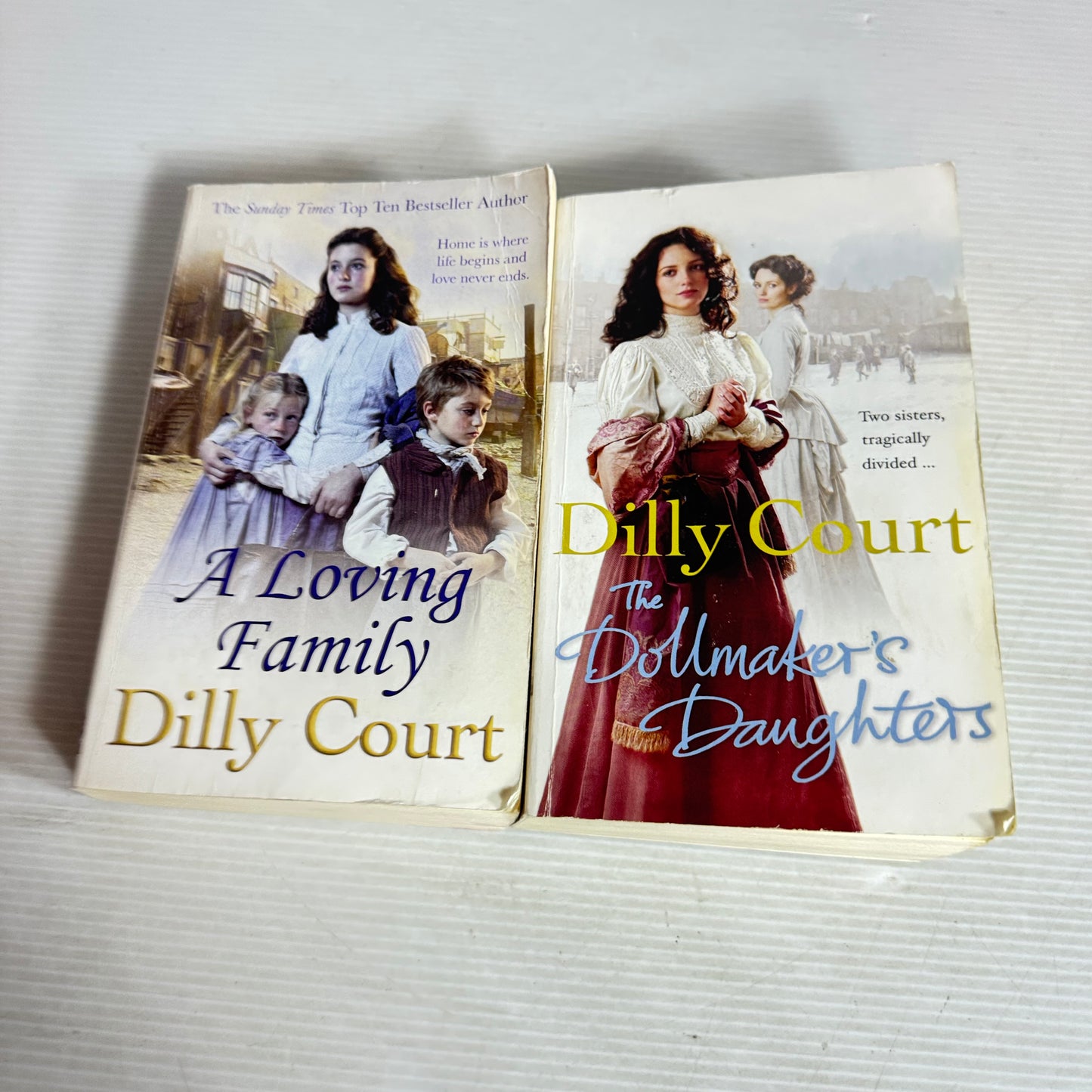Dilly Court Book Bundle x 2 : The Dollmaker's Daughters & A Loving Family (3033)