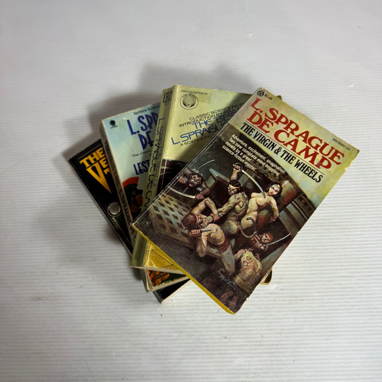 L. Sprague De Camp Vintage Book Bundle x 4 : Science Fiction Book Club Selection (1978), The Virgin & The Wheels  (1976), The Venom Trees of Sunga (1992), Lest Darkness Fall (1949)(2948)