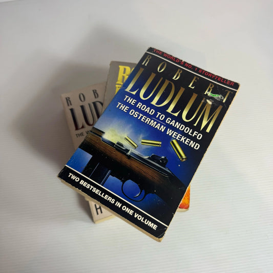 Robert Ludlum Book Bundle x 3 Books x 4 Stories : The Road to Gandolfo, The Osterman Weekend, The Apocalypse Watch, The Crey of the Halidon(2339)