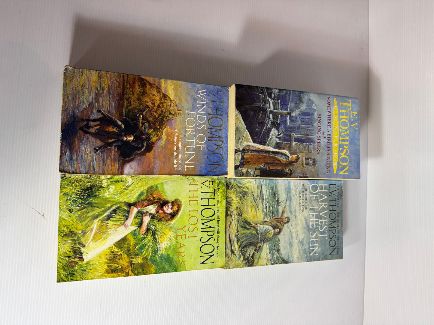 E.V. Thompson Book Bundle x 4 : Somewhere A Bird Singing and Singing Spears, Harvest of the Sun, Winds of Fortune, The Lost Years(3120)
