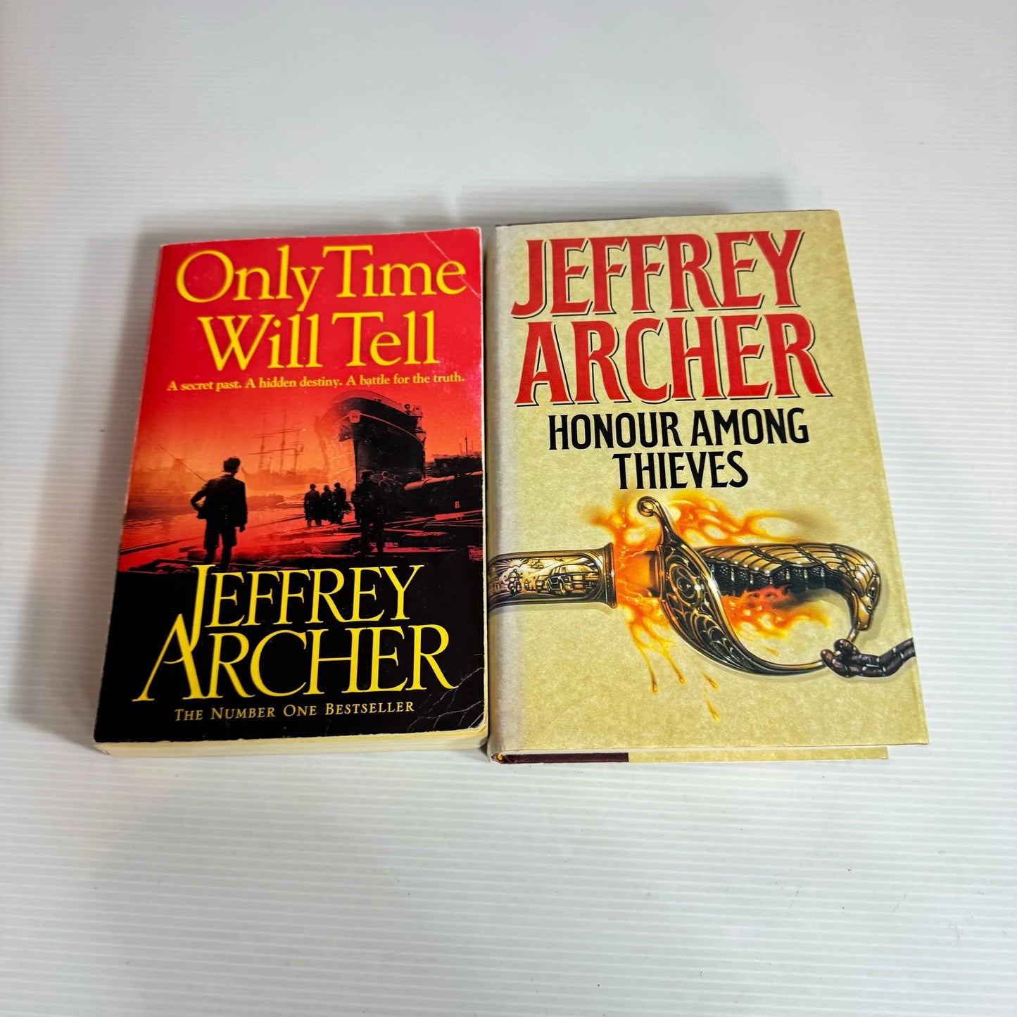 Jeffrey Archer Book Bundle x 2 : Only Time Will Tell & Honour Among Thieves (2268)