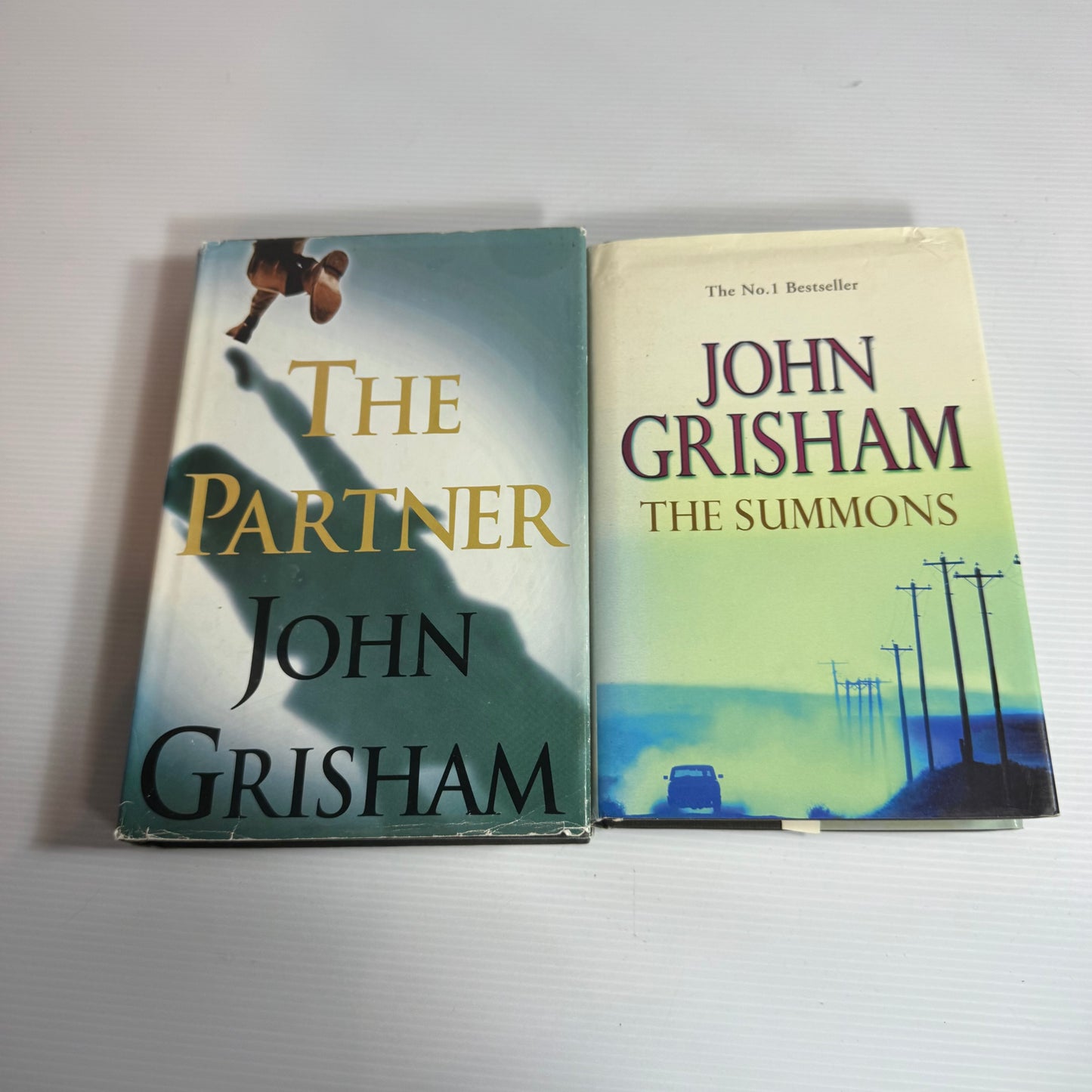 John Grisham Hardcover Book Bundle x 2 : The Summons & The Partner (3279)