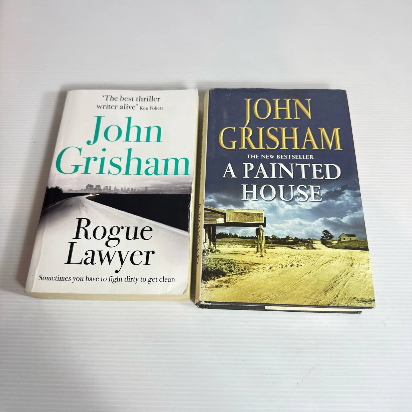 John Grisham Book Bundle x 2 : Rogue Lawyer & A Painted House (2269)