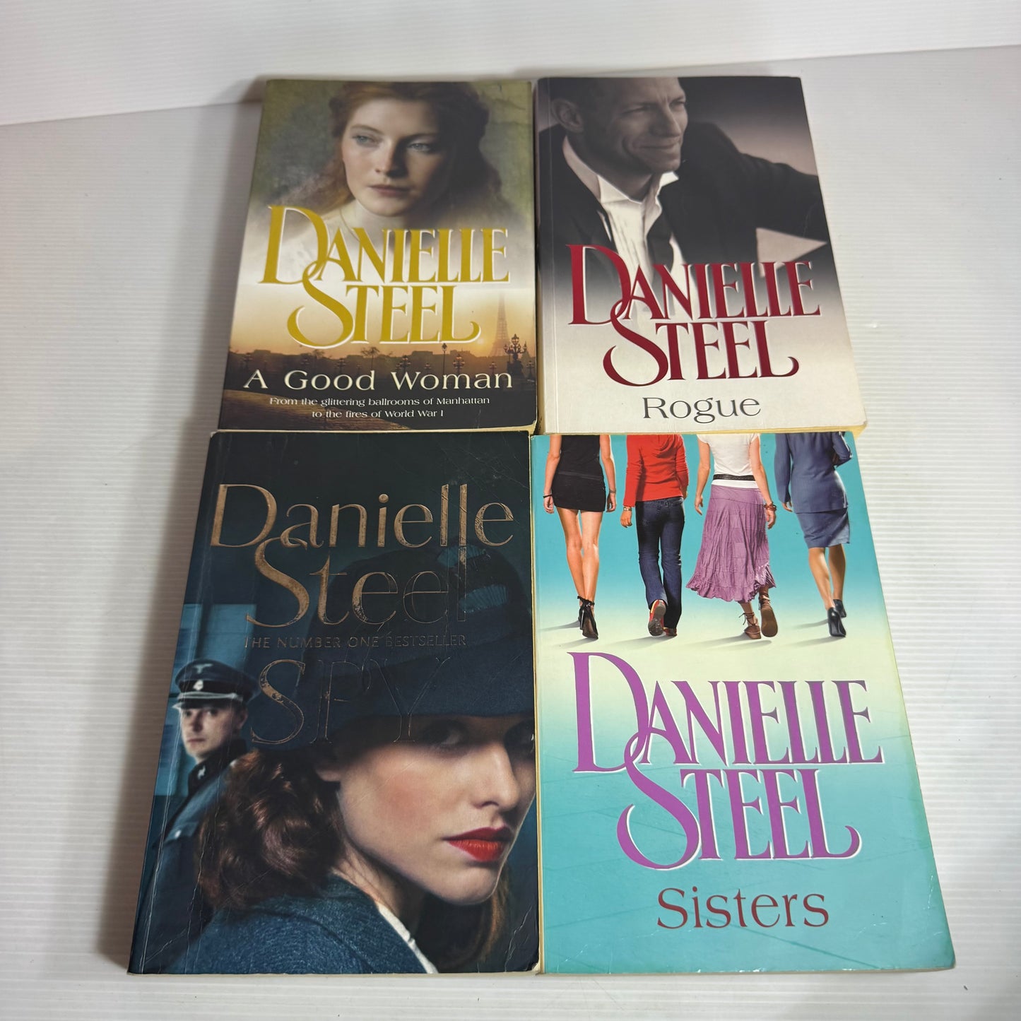 Danielle Steel Large Paperback Book Bundle x 4 : A Good Woman, Spy, Rogue, Sisters (2820)