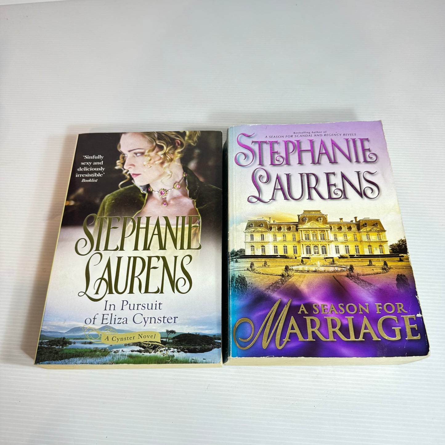 Stephanie Laurens Book Bundle x 2 : In Pursuit of Eliza Cynster & A Season for Marriage (2439)