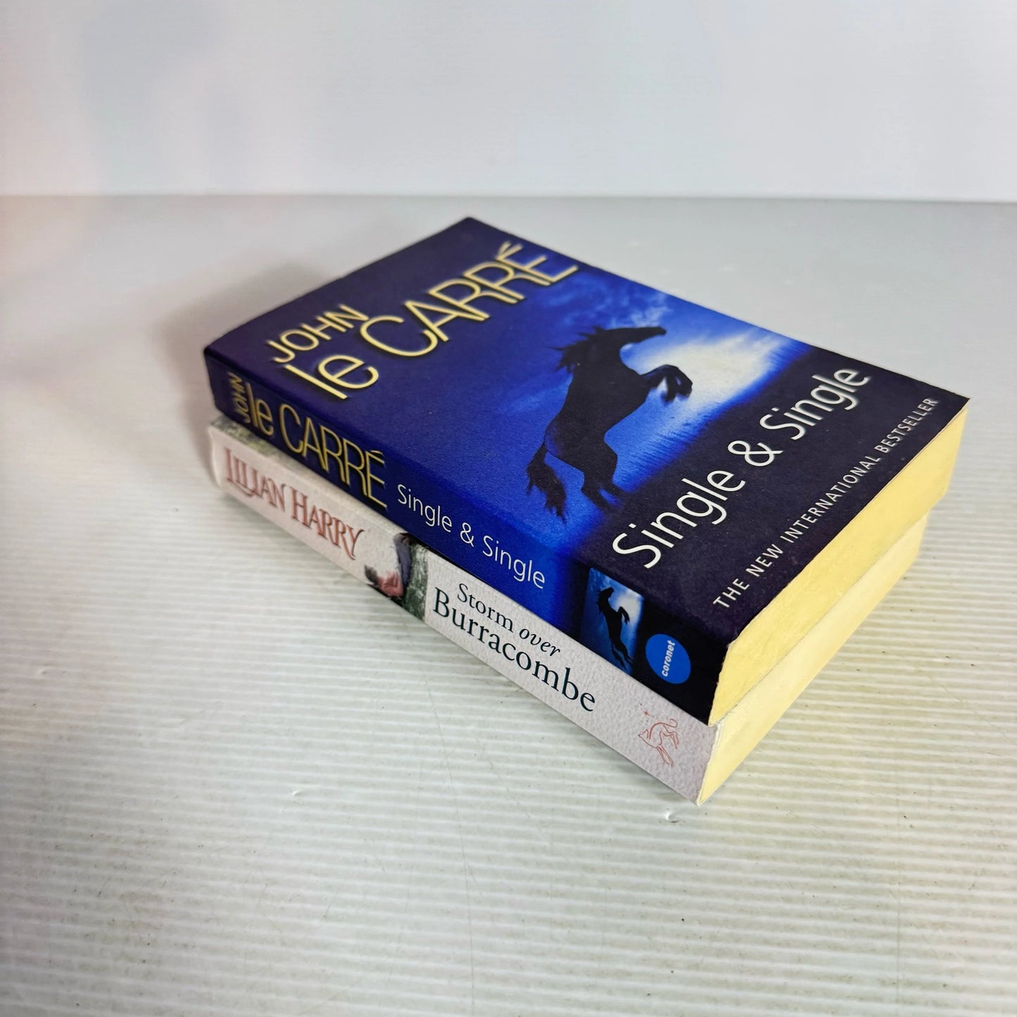 Spy Fiction Book Bundle x 2 Books : Single & Single - John Le Carre & Storm over Burracombe - Lillian Harry (713)