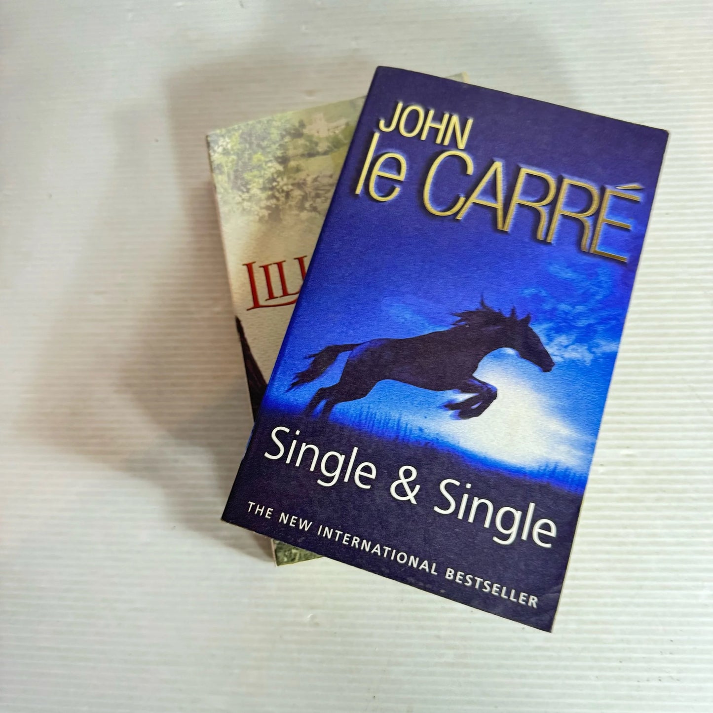 Spy Fiction Book Bundle x 2 Books : Single & Single - John Le Carre & Storm over Burracombe - Lillian Harry (713)
