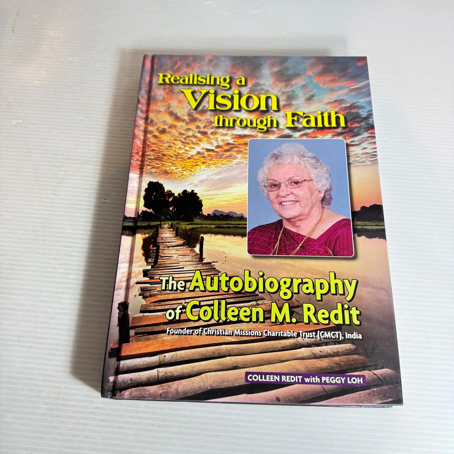 Realising a Vision through Faith : The Autobiography of Colleen M. Redit
