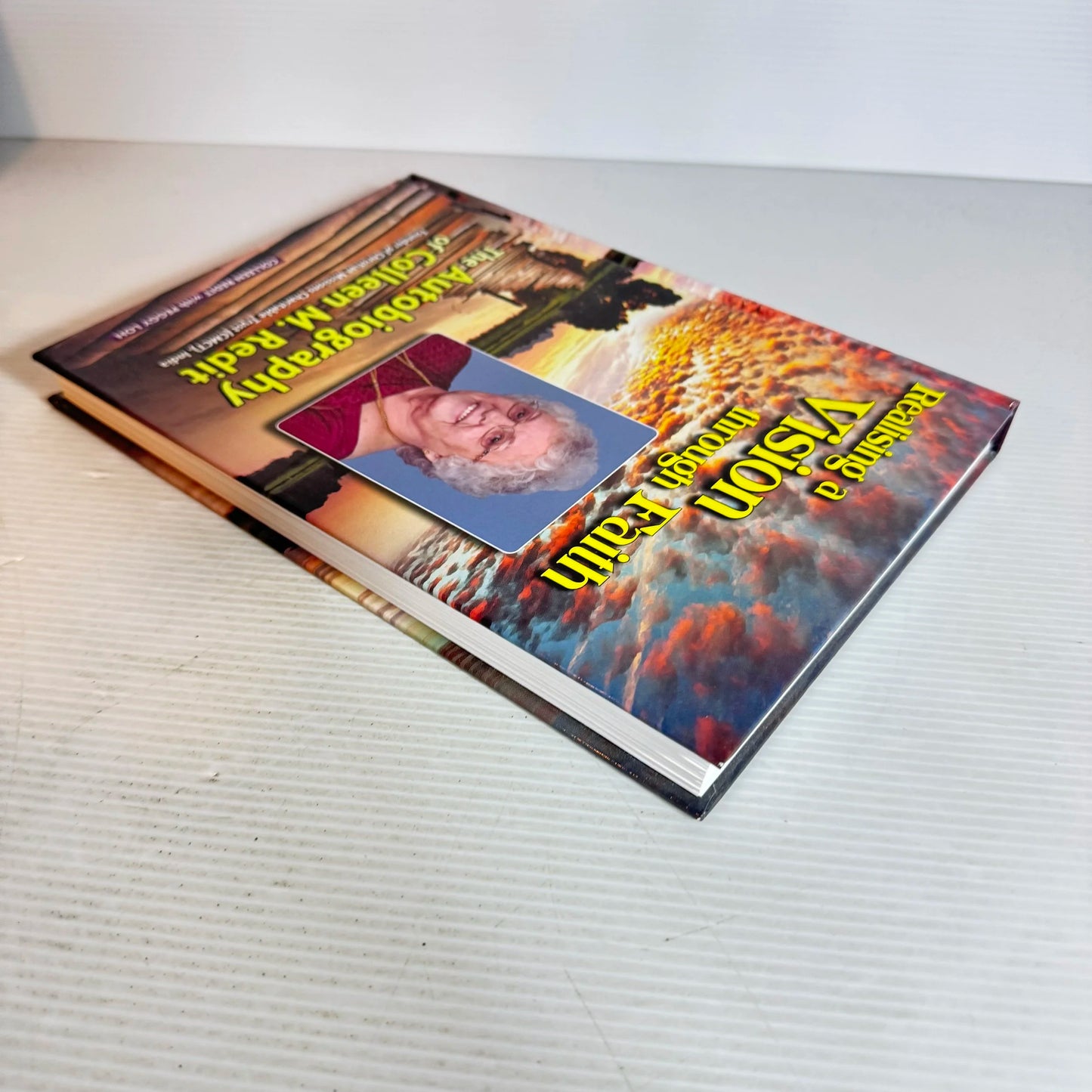 Realising a Vision through Faith : The Autobiography of Colleen M. Redit
