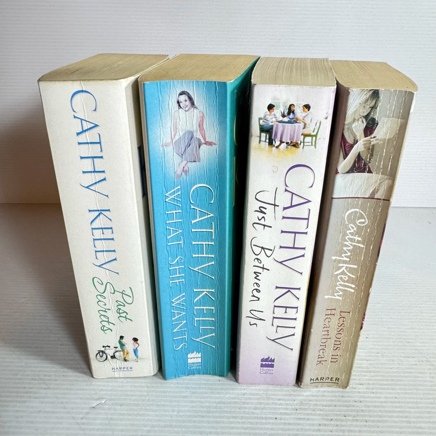 Cathy Kelly Book Bundle x 4 (645) Just Between Us, Lessons in Heartbreak, Past Secrets, What She Wants