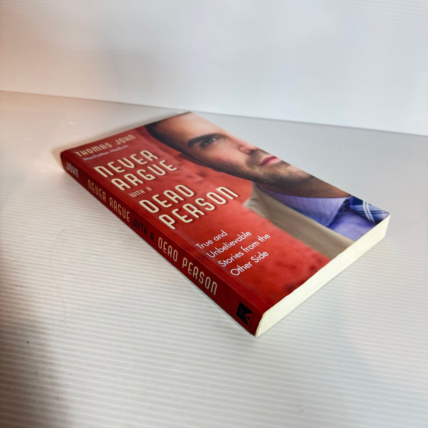 Never Argue with a Dead Person : True and Unbelievable Stories from the Other Side - Thomas John