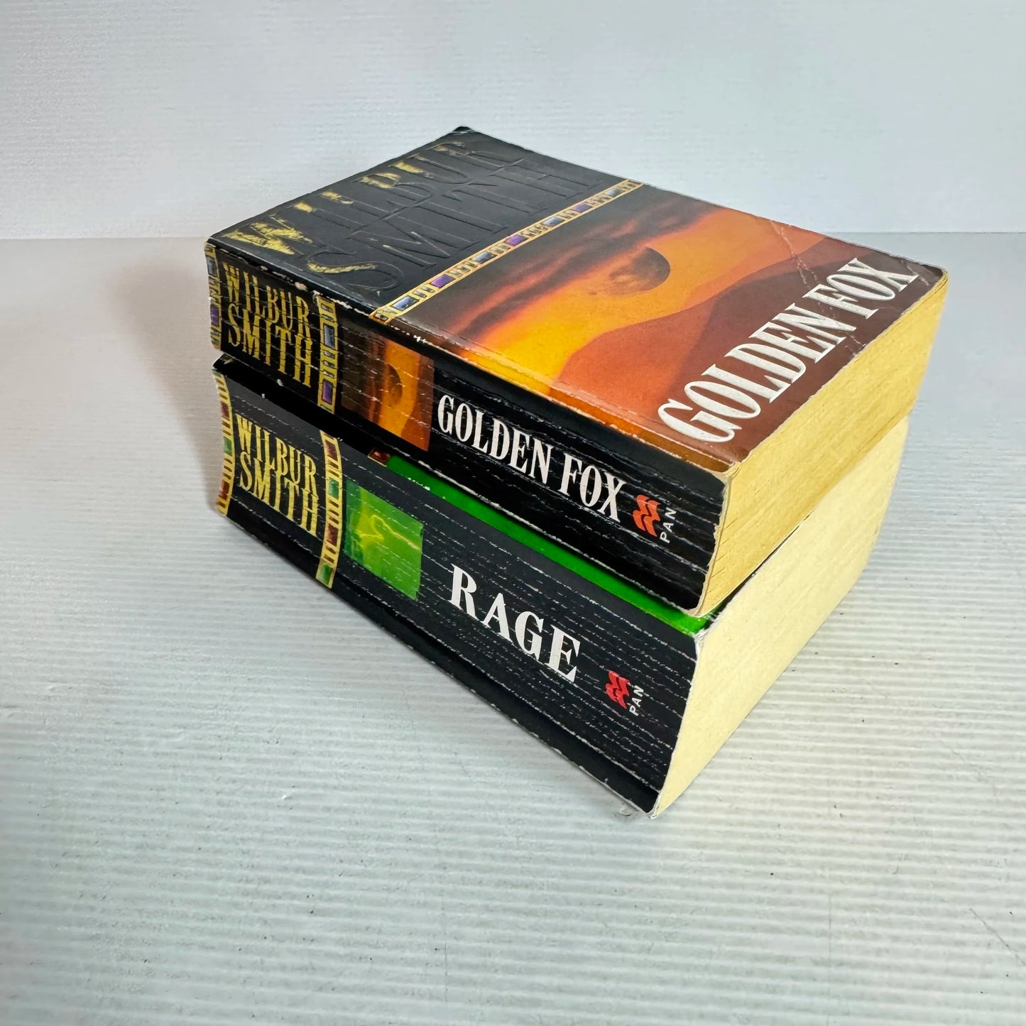 Wilbur Smith Book Bundle x 2 Books : Golden Fox & Rage (605)