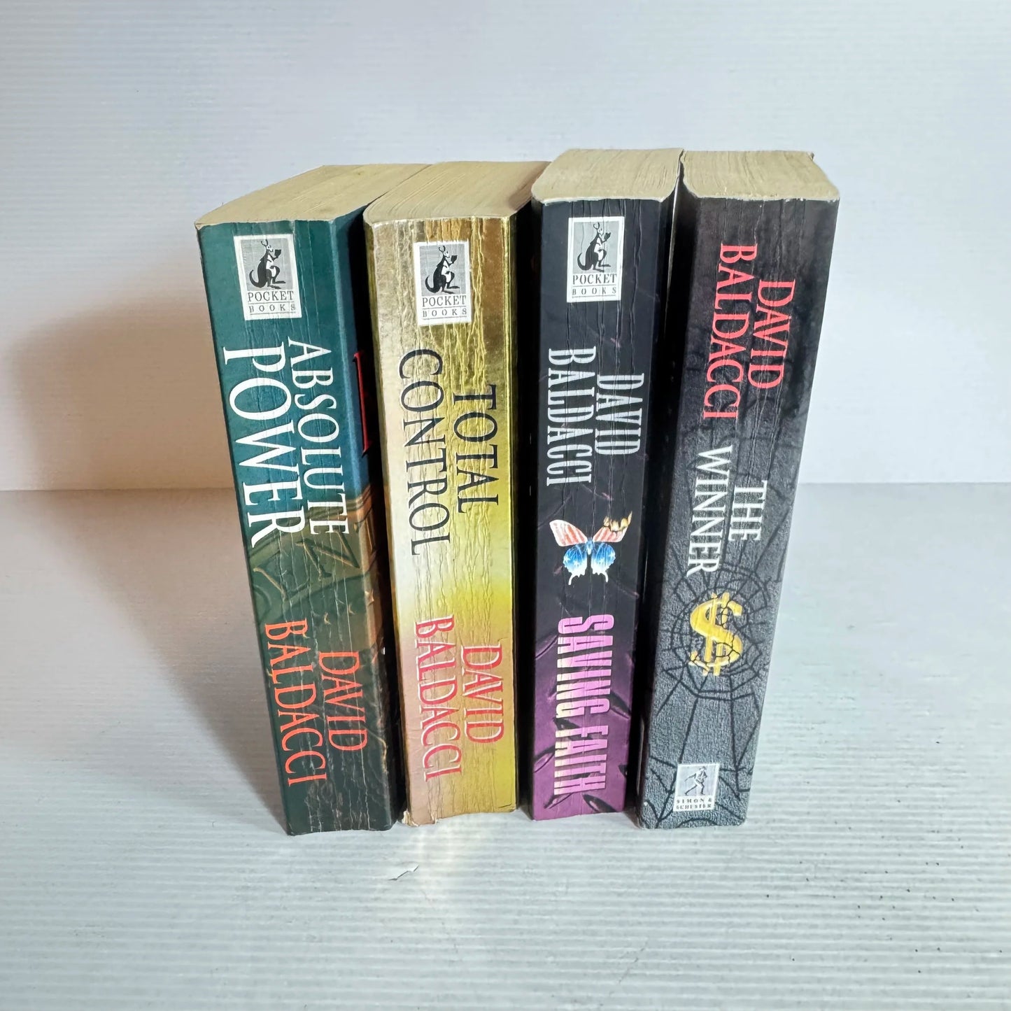 David Baldacci Book Bundle x 4 Books : Saving Faith, The Winner, Total Control, Absolute Power (585)