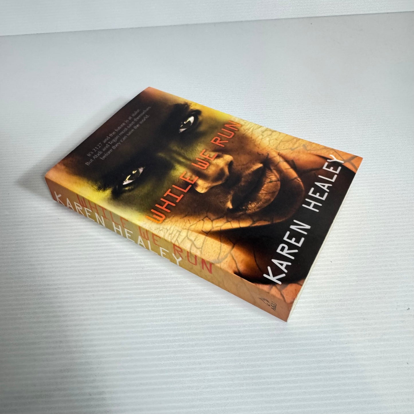 While We Run - Karen Healey (Inscription by Author)