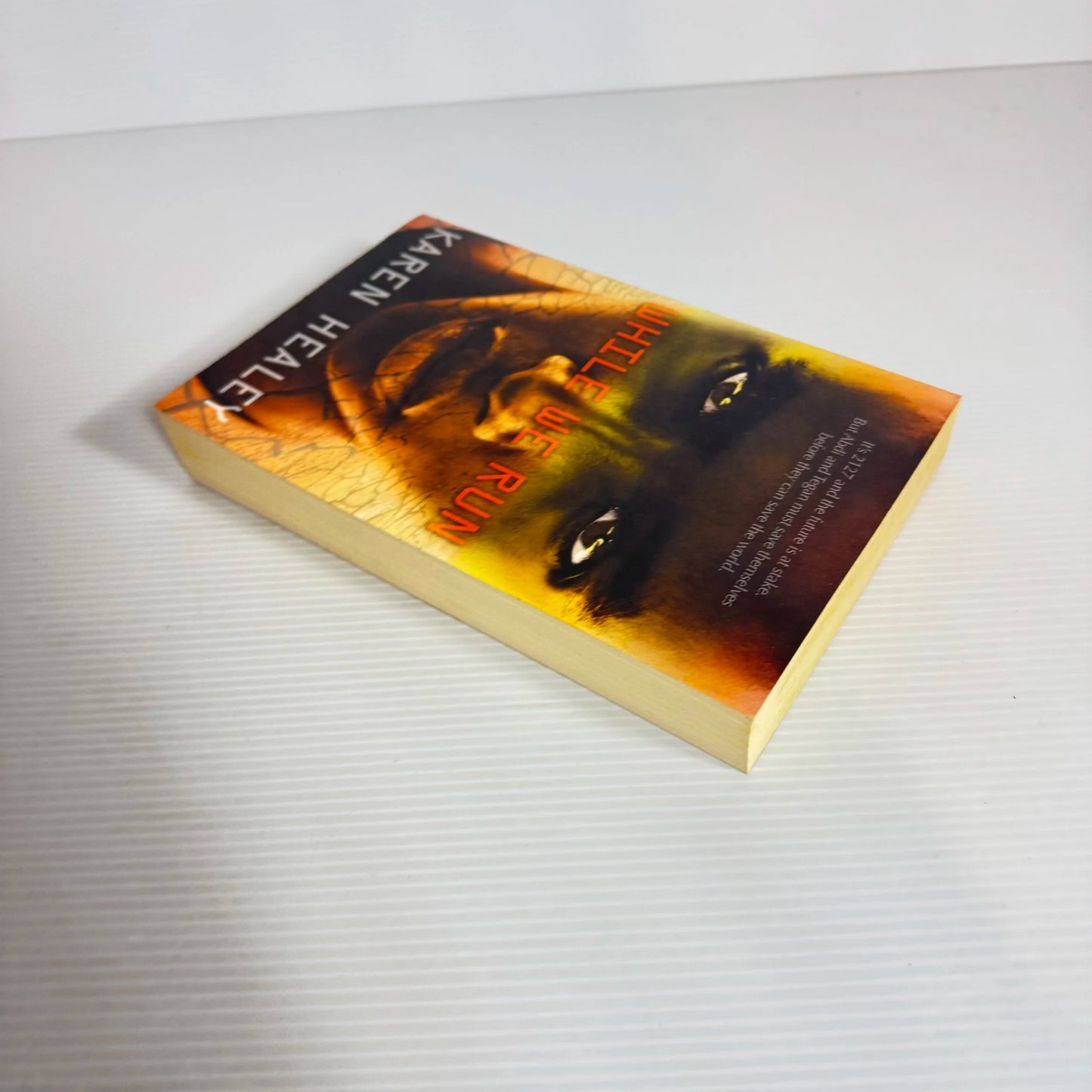 While We Run - Karen Healey (Inscription by Author)