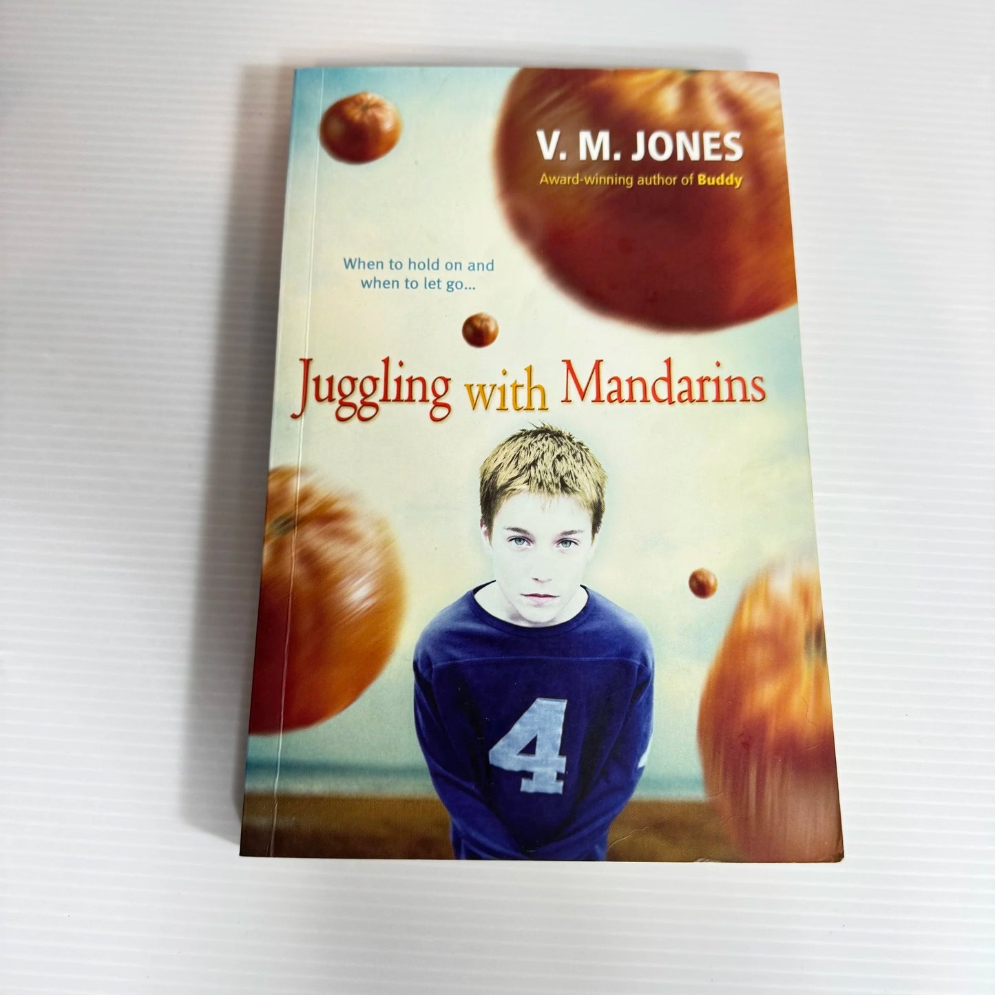 Juggling with Mandarins - V. M. Jones
