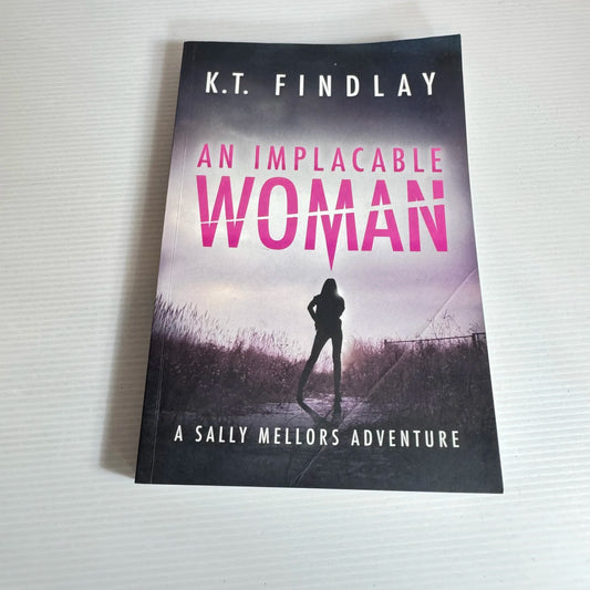 An Implacable Woman : A Sally Mellors Adventure - K.T. Findlay